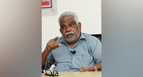 Professor M Kunjaman