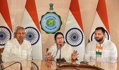 Bihar CM Nitish Kumar, West Bengal CM Mamata Banerjee and Bihar Dy CM Tejashwi Yadav at a meeting in Kolkata on April 24, 2023. (Photo | PTI)
