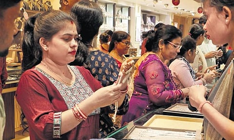 People buying gold jewellery at a shop in Bhubaneswar on Sunday | Shamim Qureshy