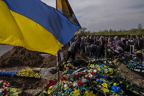 Friends and relatives attend the funeral of Ukrainian serviceman Andrii Vorobiov at the Kryvyi Rih cemetery in eastern Ukraine, Monday, April 24, 2023. (Photo | AP)