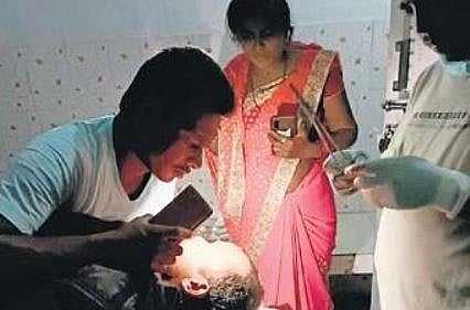 In this representational image, a patient being treated under mobile phone torchlight at Marshaghai Community Health Centre in December 2022.