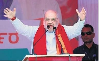 Home Minister Amit Shah addresses a rally at Banahatti on Tuesday