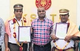 KSRTC MD Anbu Kumar felicitates Ejaz Ahmed Sharif and Ishaq Sharif