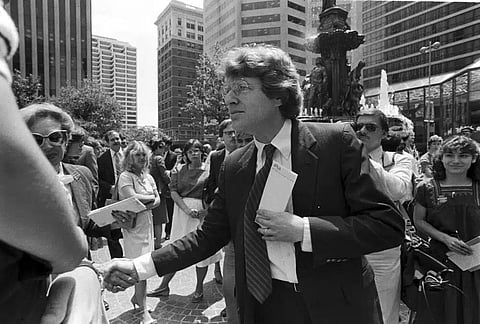 FILE - Democratic gubernatorial candidate Jerry Springer greets supporters at a rally on Fountain Square in Cincinnati, Ohio on June 3, 1982. (Photo | AP)