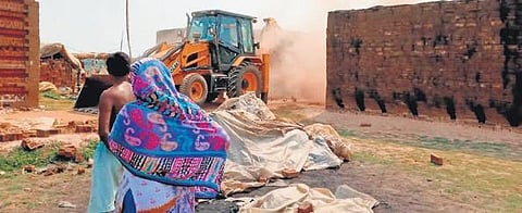 An illegal brick kiln being demolished in Kendrapara  district