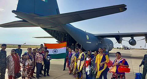 Indians board an IAF C-130J flight to depart from Port Sudan for Jeddah under Operation Kaveri (Photo | PTI)
