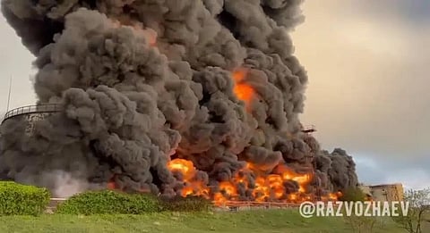 In this handout video grab released by the Governor of Sevastopol Mikhail Razvozhaev telegram channel on Saturday, April 29, 2023, smoke and flame rise from a burning fuel tank. (Photo | AP)