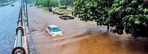 File photo of the waterlogged service road in front of Iskcon temple | Express