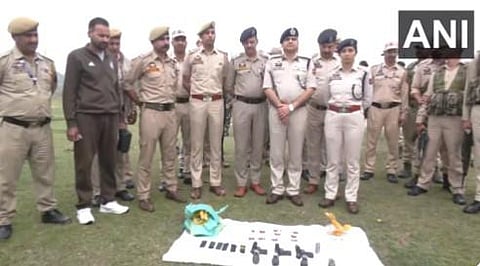 Jammu and Kashmir police recovered 3 pistols, 4 grenades, 6 magazines & 48 rounds (Photo | ANI)