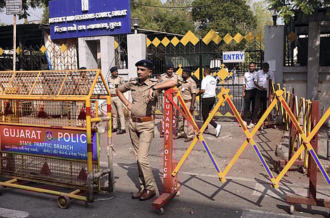 Security deployed outside the Surat District and Sessions Court ahead of Congress leader Rahul Gandhi's arrival to file an appeal against his conviction in a criminal defamation case. (Photo | PTI)