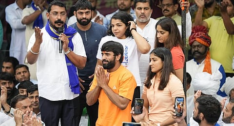 Bhim Army chief Chandra Shekhar Azad with wrestlers Bajrang Punia, Vinesh Phogat and Sakshi Malik during their protest at Jantar Mantar, in New Delhi. (Photo | PTI)