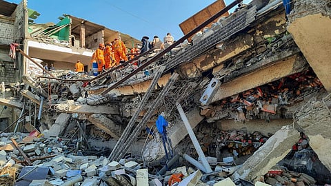 NDRF personnel carry out rescue work after collapse of the Bhiwandi Vardhaman Complex in Thane, Saturday, April 29, 2023. (Photo | PTI)