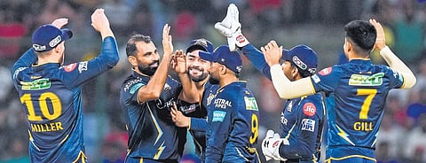 Gujarat Titans pacer Mohammed Shami (2nd from left) celebrates a wicket with teammates in their match against Delhi Capitals on Tuesday. (Photo | PTI)