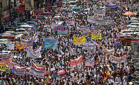 Doctors take part in a protest rally against Rajasthan's Right to Health bill, at MI Road in Jaipur, Tuesday, April 4, 2023. (Photo | PTI)