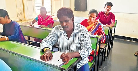 Y Yellamma (55) of Saluru, and Y Narasimhulu (55) and  Y Satyavathi (50) of P Konavalasa appear for the SSC exams at Badragiri PTG Centre | Express