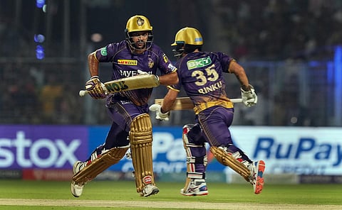 KKR batters Rinku Singh and Shardul Thakur cross each other for runs during IPL 2023 cricket match between Kolkata Knight Riders and Royal Challengers Bangalore at the Eden Garden in Kolkata.  Shardul Thakur smashed a 29-ball 68, helping KKR beat RCB by 81 runs.(Photo | PTI)