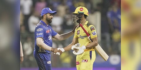Chennai Super Kings batter Ruturaj Gaikwad shakes hand with Mumbai Indians captain Rohit Sharma after winning the IPL 2023 cricket match against Mumbai Indians. (Photo | PTI)