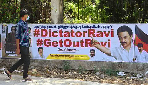 Dmk functionaries place poster across the city against Governor of Tamilnadu RN Ravi. Express/Ashwin prasath