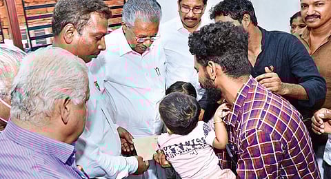 Train arson attack: CM Pinarayi Vijayan visits kin of victims