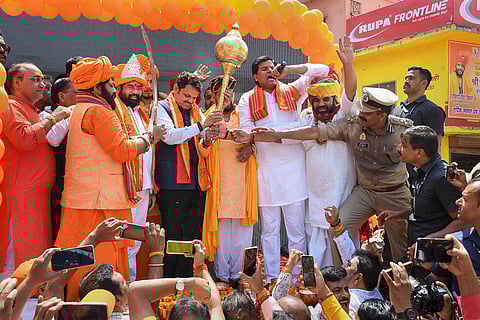 Maharashtra Chief Minister Eknath Shinde with Dy CM Devendra Fadnavis in Ayodhya. (Photo | PTI)