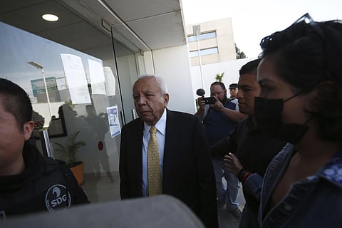 The head of Mexico's National Migration Institute, Francisco Garduño, front, arrives at court on Sunday. ( Photo | AP )