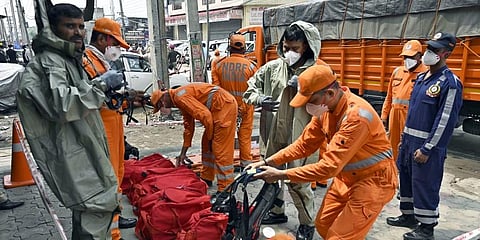 NDRF team during a rescue operation after a gas leak incident occurred at a factory in the Giaspura area of Ludhiana, Punjab on Sunday.  (Photo | ANI)