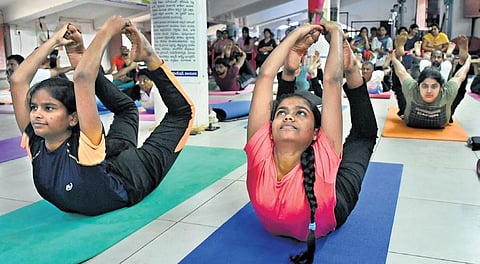 Summer yoga classes being held at IGMC Stadium in Vijayawada. (Photo I Prasant Madugula)