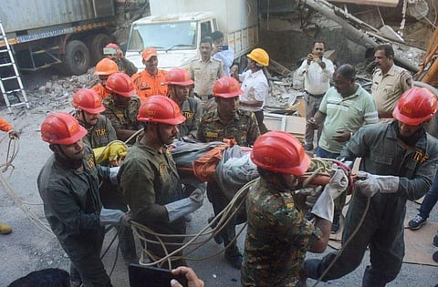 Rescue work underway after collapse of the Bhiwandi Vardhaman Complex in Thane, Saturday, April 29, 2023. (Photo | PTI)