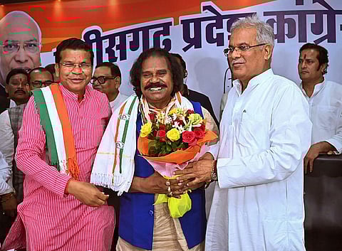 Former BJP MP Nand Kumar Sai joins the Congress party in the presence of Chhattisgarh Chief Minister Bhupesh Baghel, on May 1, 2023. (Photo | PTI)