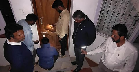 Revenue officials sealing illegal cottage