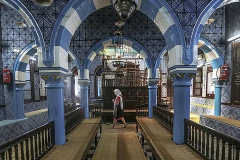 FILE - A tourist visits La Ghriba, the oldest synagogue in Africa, on the Island of Djerba, southern Tunisia, Oct. 28, 2015. (Photo | AP)