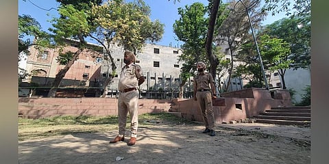 Police personnel guard at the site of a low-intensity blast that took plave near the Golden Temple in Amritsar, Thursday, May 11, 2023. (Photo | PTI)