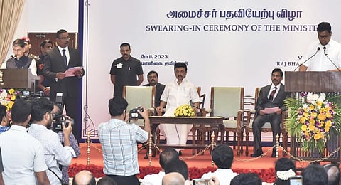Governor R N Ravi administers the oath to TRB Raja at the ceremony held in Raj Bhavan.(Express Photo | P Jawahar)