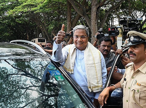 Congress leader Siddaramaiah reacts as the party leads in Assembly polls in the early trends on the vote counting day, in Mysuru, Saturday, May 13, 2023. (Photo | PTI)