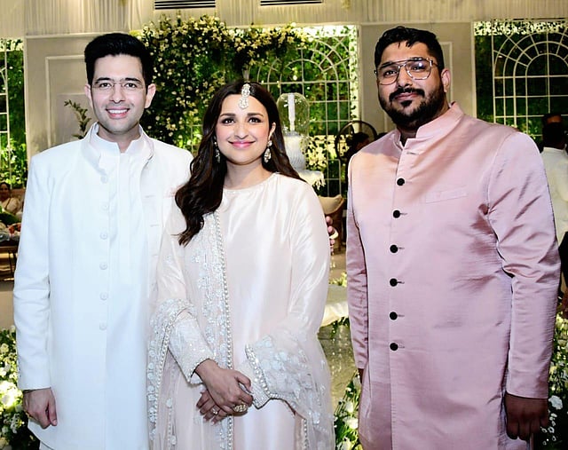 Raghav and Parineeti with guests at their intimate engagement ceremony. (Photo | Akshay Malhotra Twitter)