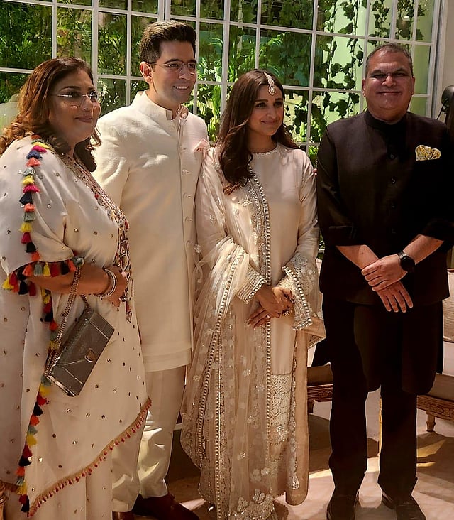 Raghav and Parineeti with guests at their intimate engagement ceremony. (Photo | Twitter)
