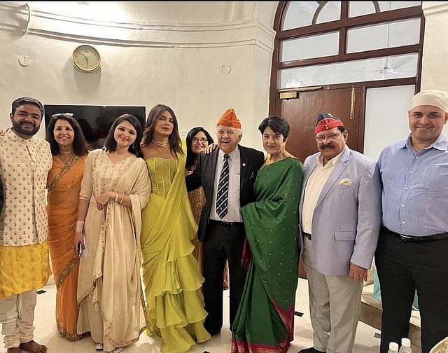 Raghav and Parineeti with their family members at their intimate engagement ceremony. Parineeti's cousins Priyanka and Siddharth are seen. Priyanka wrote in her post, 'Congratulations Tisha and Raghav... Cannot wait for the wedding! So happy for you both and the families so fun to catch up with the fam!' (Photo | Siddharth Chopra Instagram)