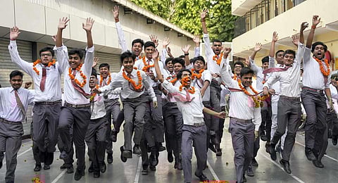 Students celebrating after the declaration of results; image used for representative purpose only