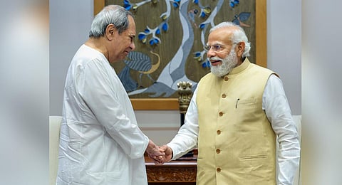 Odisha Chief Minister Naveen Patnaik greets Prime Minister Narendra Modi during a meeting, in New Delhi, Thursday, May 11, 2023. (Photo | PTI)
