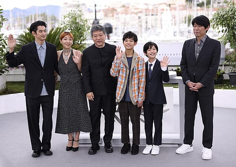Eita Nagayama, from left, Sakura Ando, Hirokazu Koreeda, Soya Kurokawa, Hinata Hiiragi, and Yuji Sakamoto for 'Monster' at the 76th international film festival, Cannes. (Photo | AP)