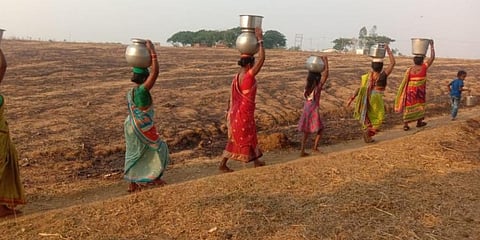 In this June 2021 image, women and kids carrying water in Nabarangpur village, Odisha. (File Photo | EPS)