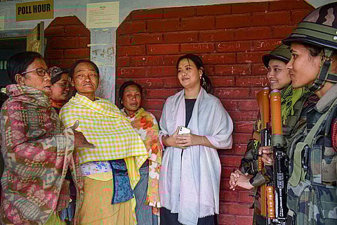 Riflewomen of Assam Rifles interact with locals as part of Area Domination Patrol to restore peace and harmony in the violence-hit Manipur. (Photo | PTI)