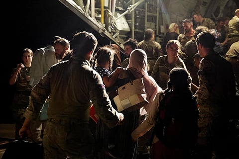 The last evacuees and military personnel board an RAF aircraft bound for Cyprus from Wadi Seidna Air Base in Sudan,  April 29, 2023. ( Photo | AP )