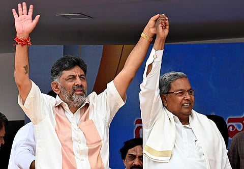 Newly-elected Karnataka Chief Minister Siddaramaiah with his deputy DK Shivakumar during their oath ceremony.  (Photo | Shashidhar Byrappa, EPS)