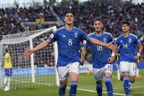Italy's Cesare Casadei celebrates with teammates after scoring his side's 2nd goal during a FIFA U-20 World Cup Group D soccer match against Brazil at the Mendoza Stadium in Mendoza. (Photo | AP)