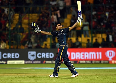 Shubman Gill raises his bat after scoring a century against RCB at Chinnaswamy stadium in Bengaluru. (Photo | Vinod Kumar T, EPS)