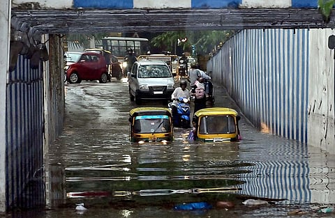 Vehicles stuck at the underpass near K R Circle due to heavy rain in Bengaluru. (Photo | Express)