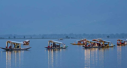 G20 delegates take a ride on shikaras, at Dal Lake in Srinagar, Monday, May 22, 2023. They arrived the city for the third tourism working group meeting of the G20 countries. (PTI)