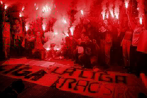 People protest against racism suffered by Brazilian soccer star Vinicius Junior who plays for Spain's Real Madrid, outside the Spanish Consulate in Sao Paulo, Brazil. (Photo | AP)