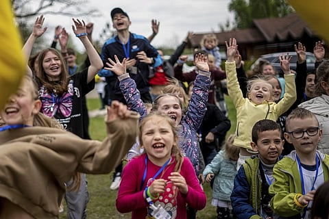 Children dance at the recovery camp for children and their mothers affected by the war near Lviv, Ukraine, Wednesday, May 3, 2023. (Photo | AP)